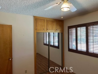 15100 Blackfoot Road Apple Valley, CA 92307 - Photo 12 of 18 a view of an empty room with a window