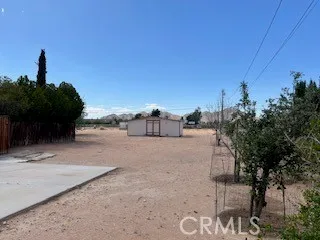 a view of a road with a building in the background