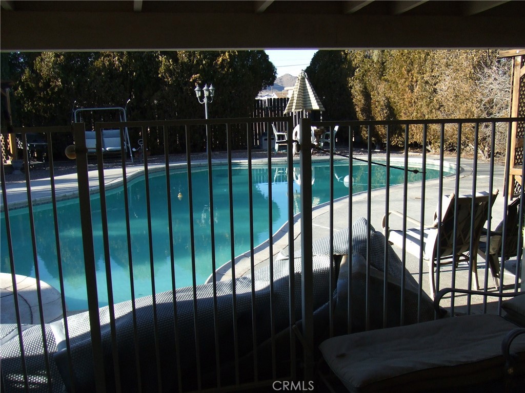15100 Blackfoot Road Apple Valley, CA 92307 - Photo 9 of 18 a view of a balcony