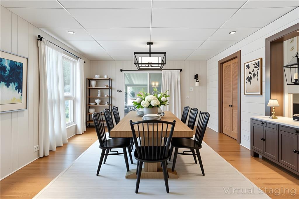 121 Orchard Drive Prospect, PA 16052 - Photo 18 of 46 a view of a dining room with furniture window and wooden floor