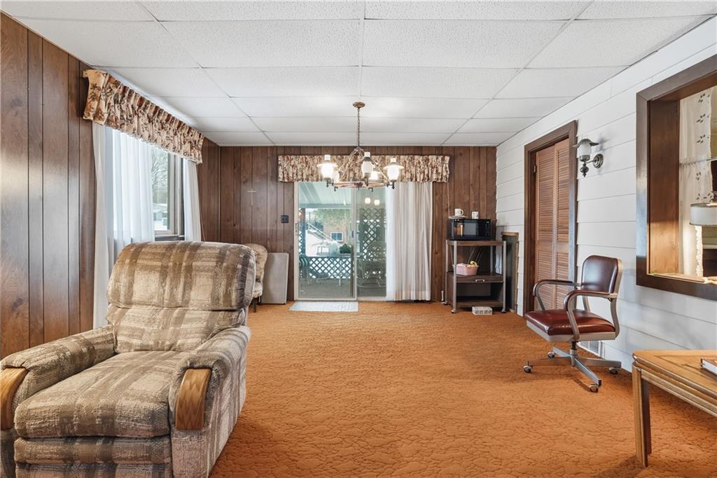 121 Orchard Drive Prospect, PA 16052 - Photo 19 of 46 a bed room with a bed and glass door