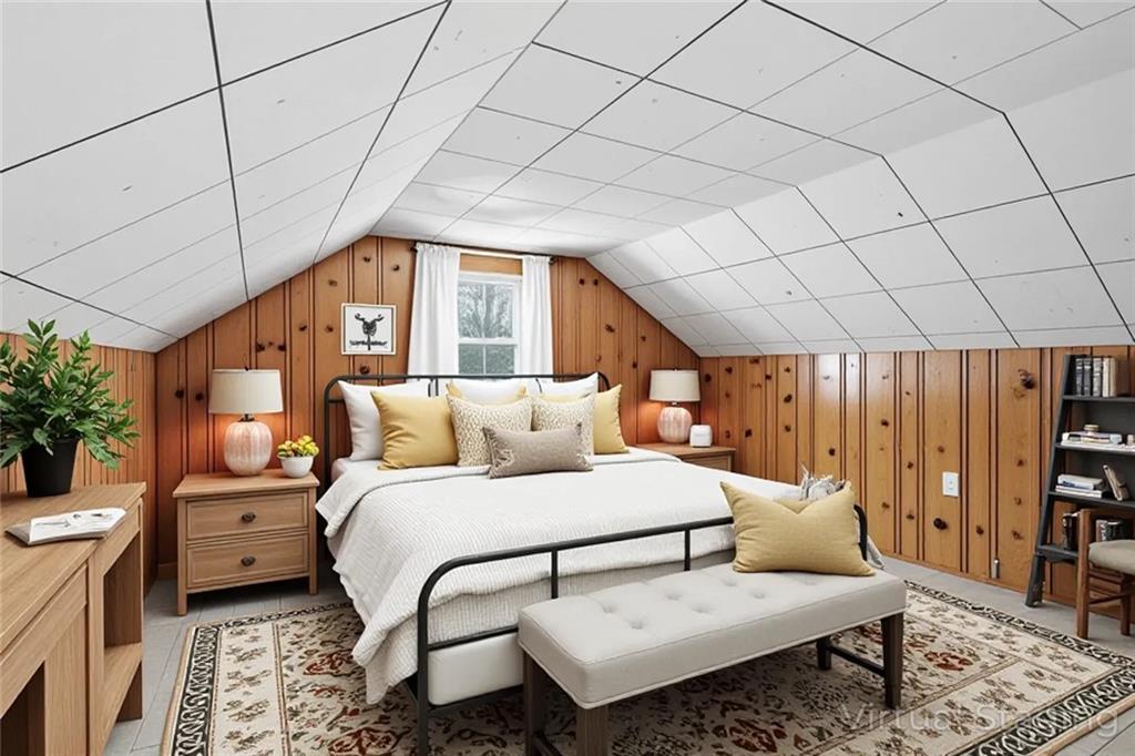 121 Orchard Drive Prospect, PA 16052 - Photo 31 of 46 a bedroom with a bed a couch and potted plant