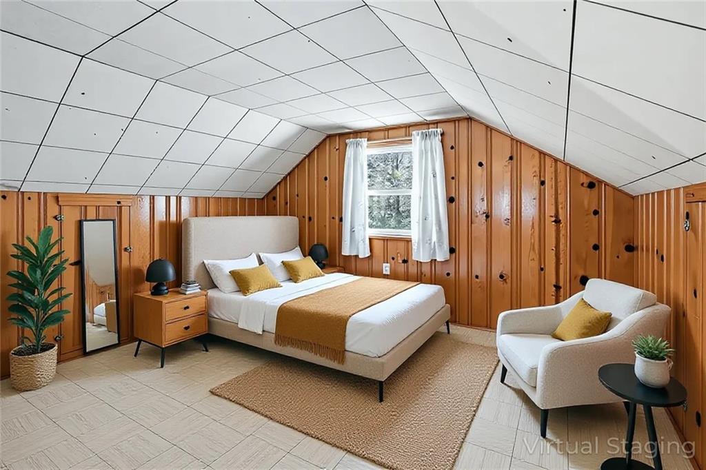 121 Orchard Drive Prospect, PA 16052 - Photo 33 of 46 a bedroom with a bed and a chandelier