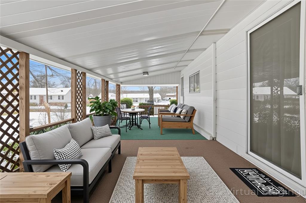 121 Orchard Drive Prospect, PA 16052 - Photo 4 of 46 a living room with furniture and a rug