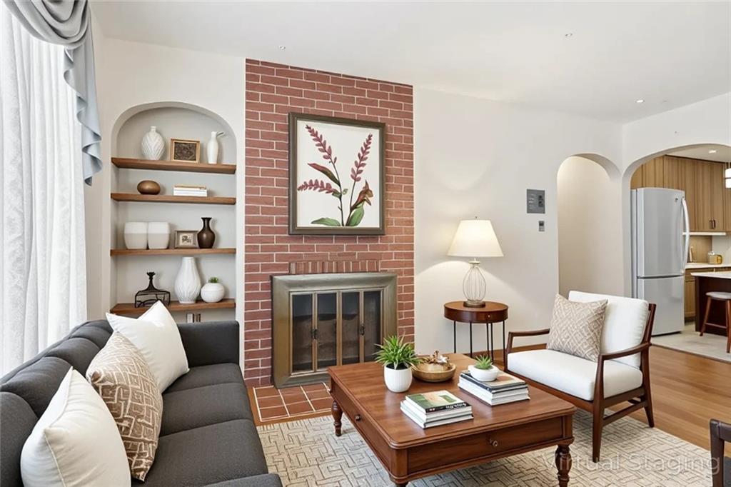 121 Orchard Drive Prospect, PA 16052 - Photo 7 of 46 a living room with furniture and a fireplace