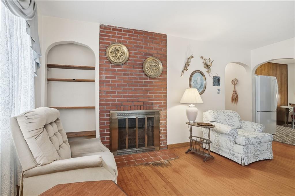 121 Orchard Drive Prospect, PA 16052 - Photo 8 of 46 a living room with furniture and a fireplace