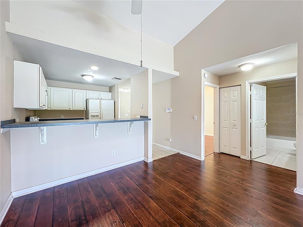 100 Silver Sea Road Winter Springs, FL 32708 - Photo 13 of 44 a view of kitchen with wooden floor