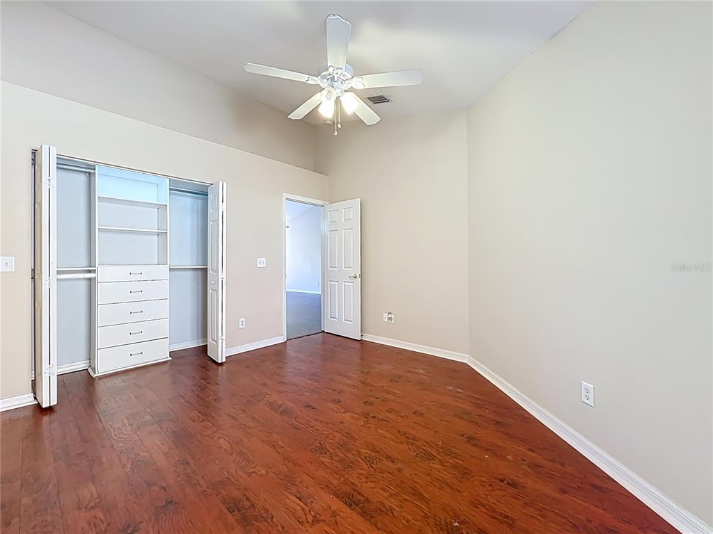 100 Silver Sea Road Winter Springs, FL 32708 - Photo 17 of 44 a view of an empty room with wooden floor