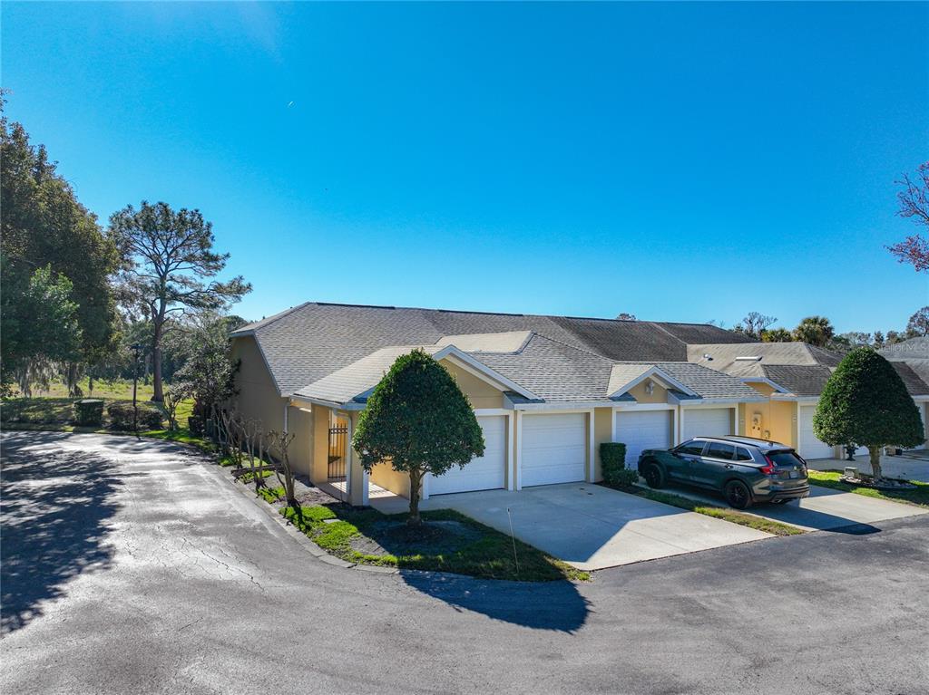 100 Silver Sea Road Winter Springs, FL 32708 - Photo 2 of 44 a view of houses with outdoor space and parking