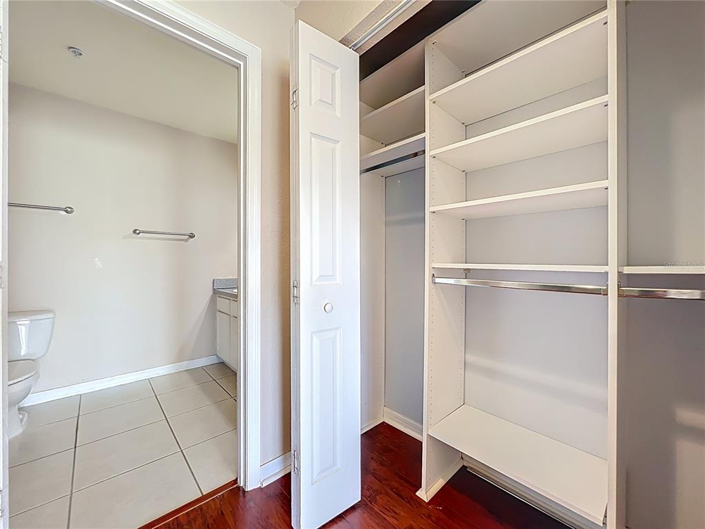 100 Silver Sea Road Winter Springs, FL 32708 - Photo 23 of 44 a view of walk in closet with empty racks