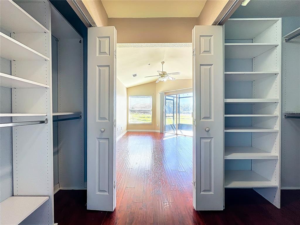 100 Silver Sea Road Winter Springs, FL 32708 - Photo 27 of 44 a view of a hallway with wooden floor and closet