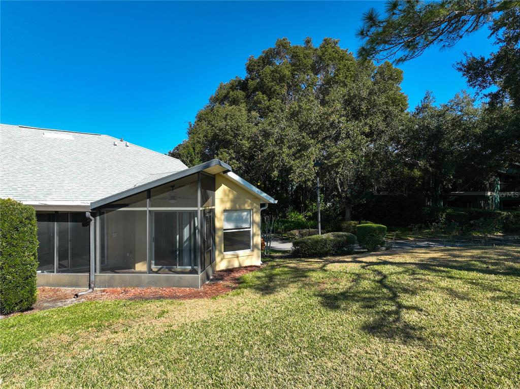 100 Silver Sea Road Winter Springs, FL 32708 - Photo 37 of 44 a view of a house with backyard and sitting area