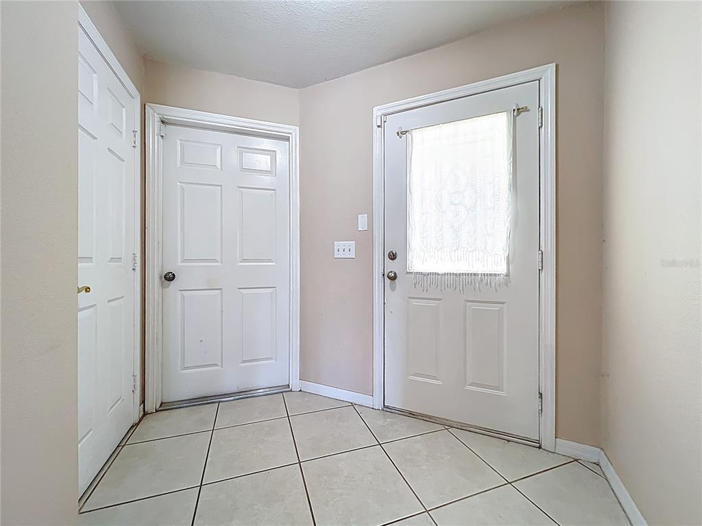 100 Silver Sea Road Winter Springs, FL 32708 - Photo 6 of 44 a view of an empty room with closet and a window