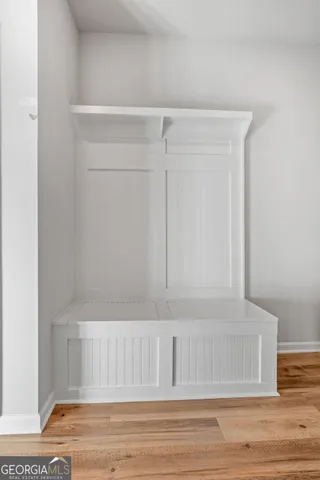 a view of small space with wooden floor