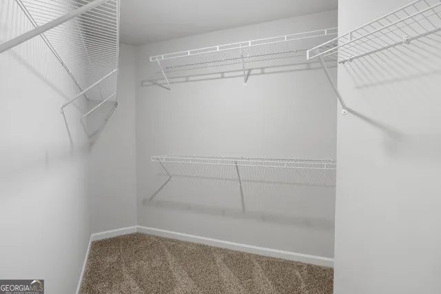 a view of a room with racks on the wall