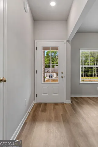 an empty room with windows