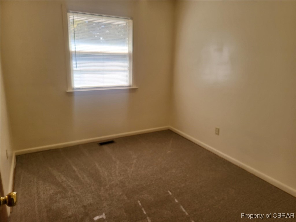 3204 West Weaver Road Hampton, VA 23666 - Photo 18 of 27 Spare room with carpet flooring