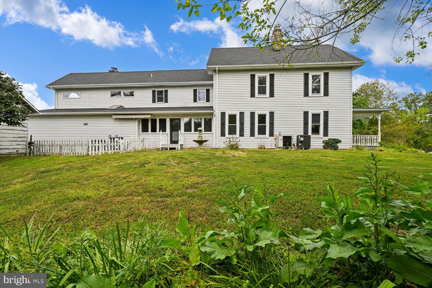 17401 Milltown Landing Road Brandywine, MD 20613 - Photo 76 of 96 Charming white home with lush green surroundings.