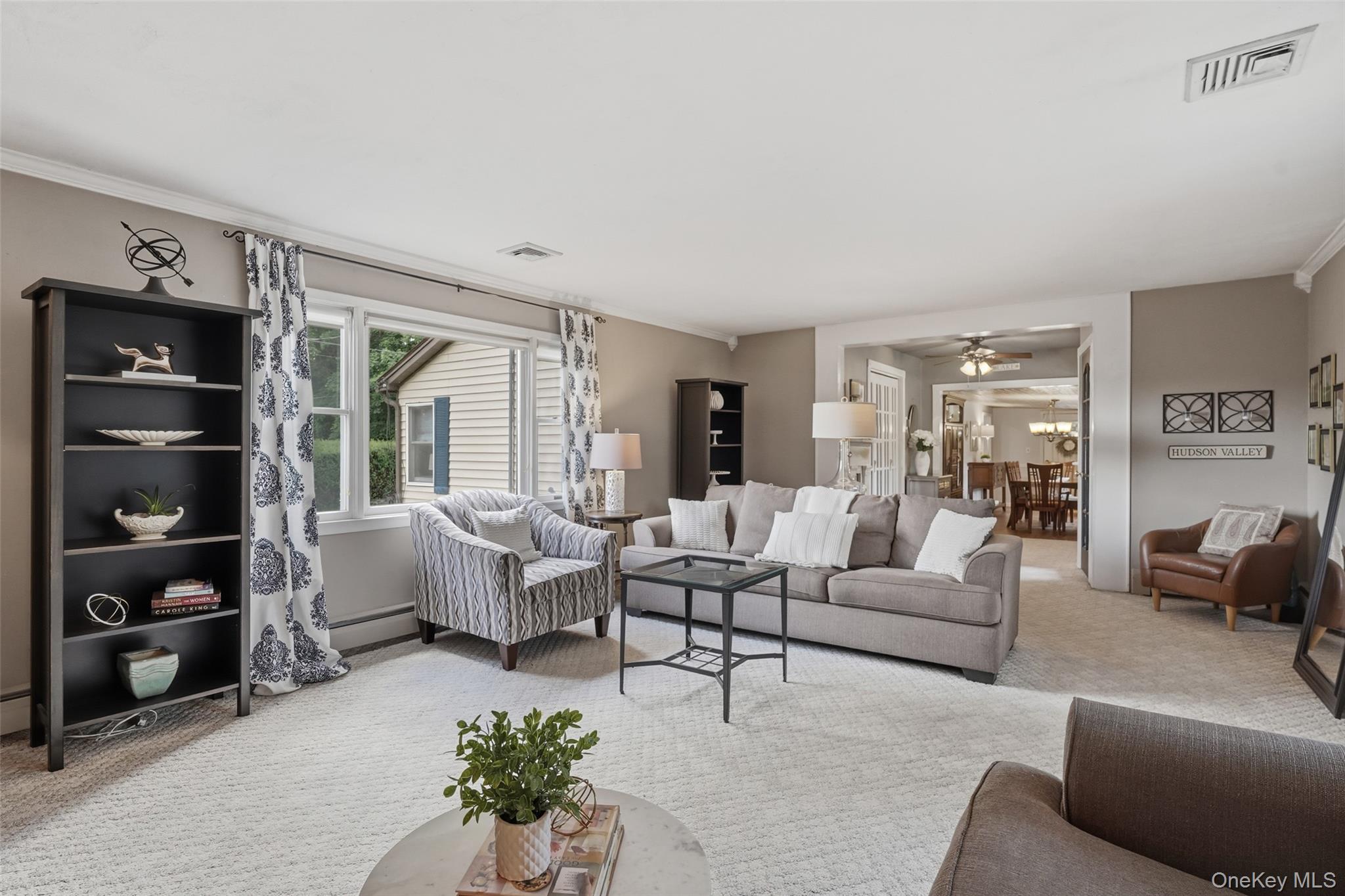 18 Sylvan Road Lake Peekskill, NY 10537 - Photo 13 of 50 Spacious living room with multiple seating areas. Great for relaxing and entertaining