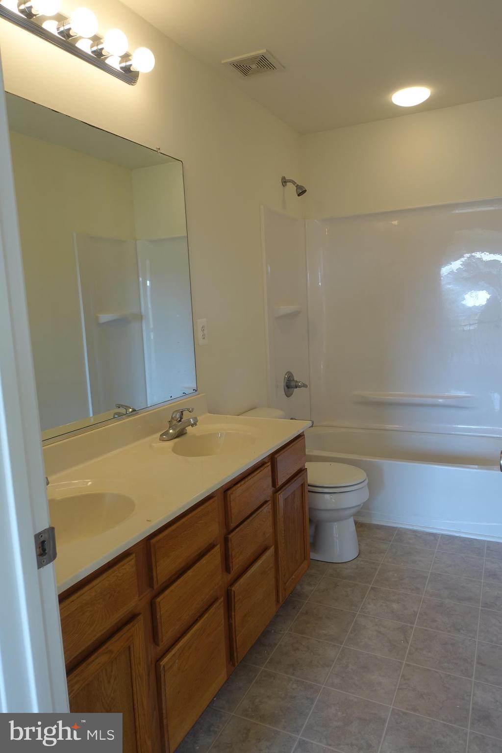 411 Robbins Farm Road Cambridge, MD 21613 - Photo 26 of 35 Hall bath with double sinks