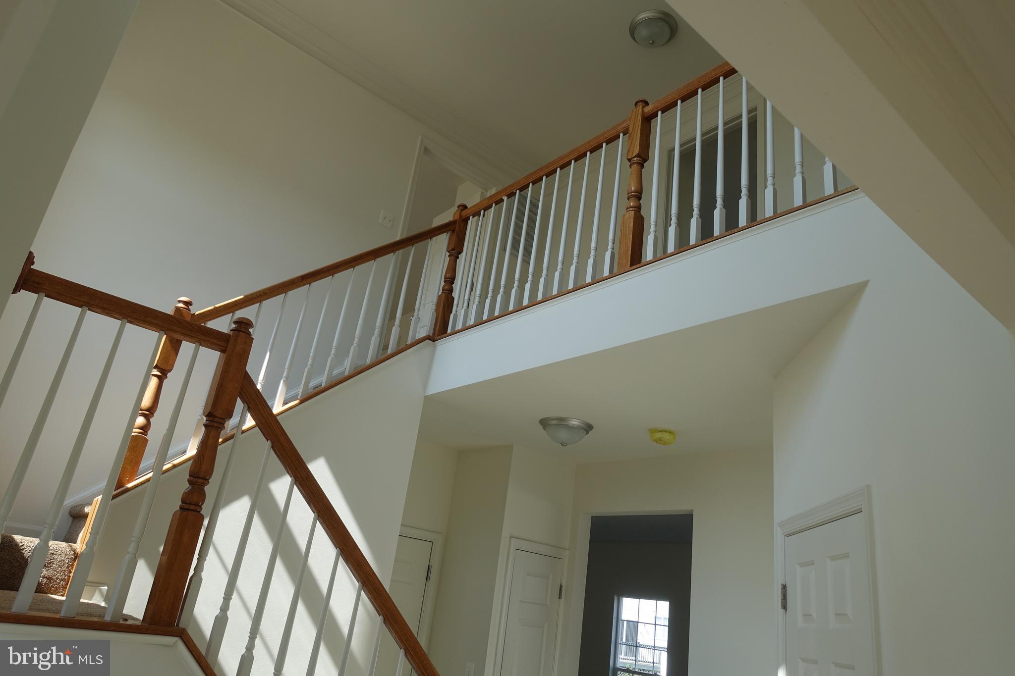 411 Robbins Farm Road Cambridge, MD 21613 - Photo 27 of 35 Open stairway to upstairs