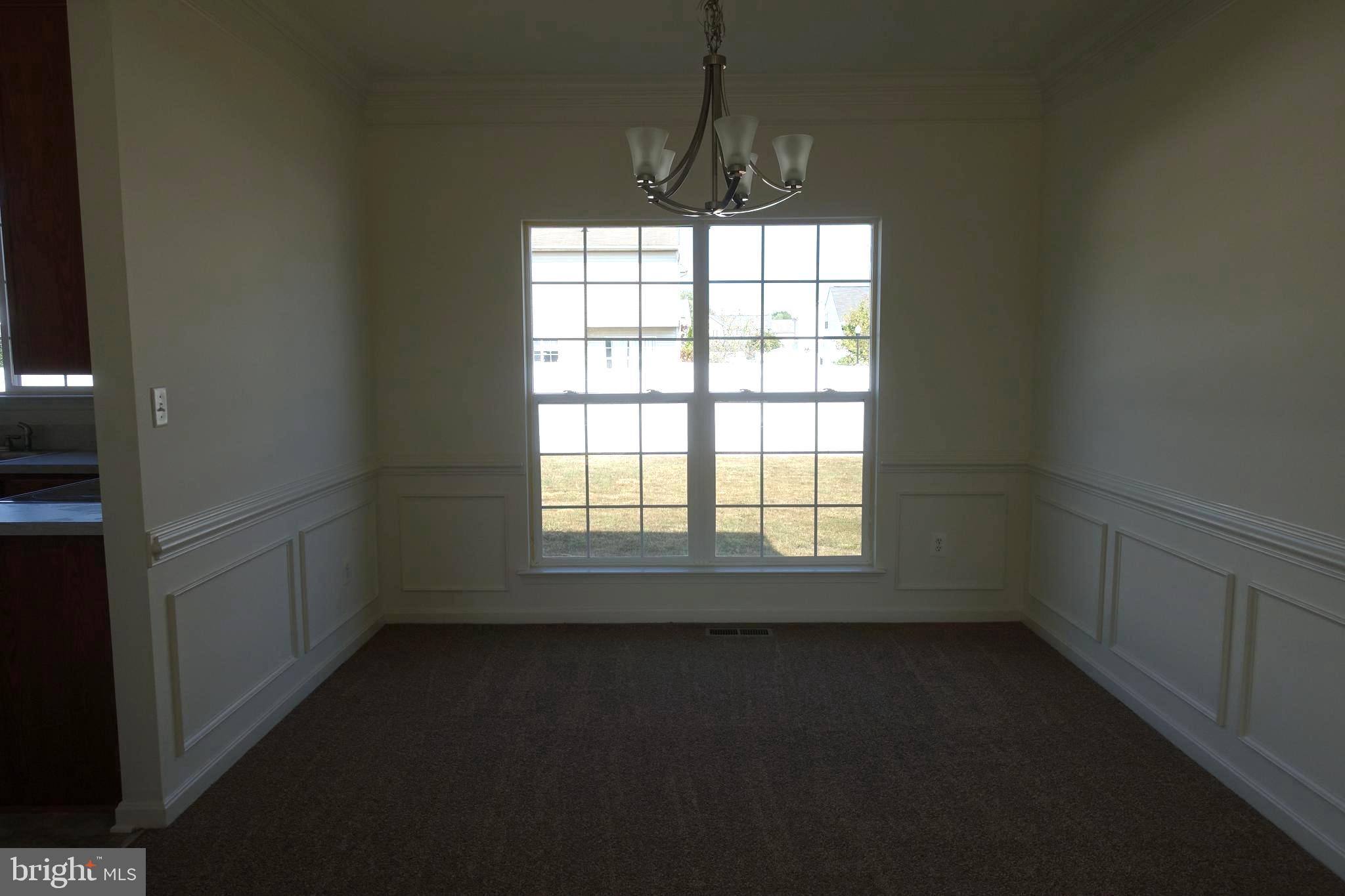 411 Robbins Farm Road Cambridge, MD 21613 - Photo 10 of 35 Elegant lighting and molding, brand new carpet