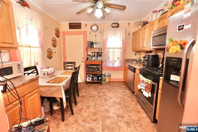a dining room with furniture and a fireplace