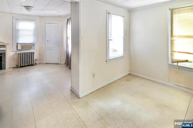 an empty room with windows