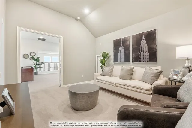 a living room with furniture a flat screen tv and a floor to ceiling window