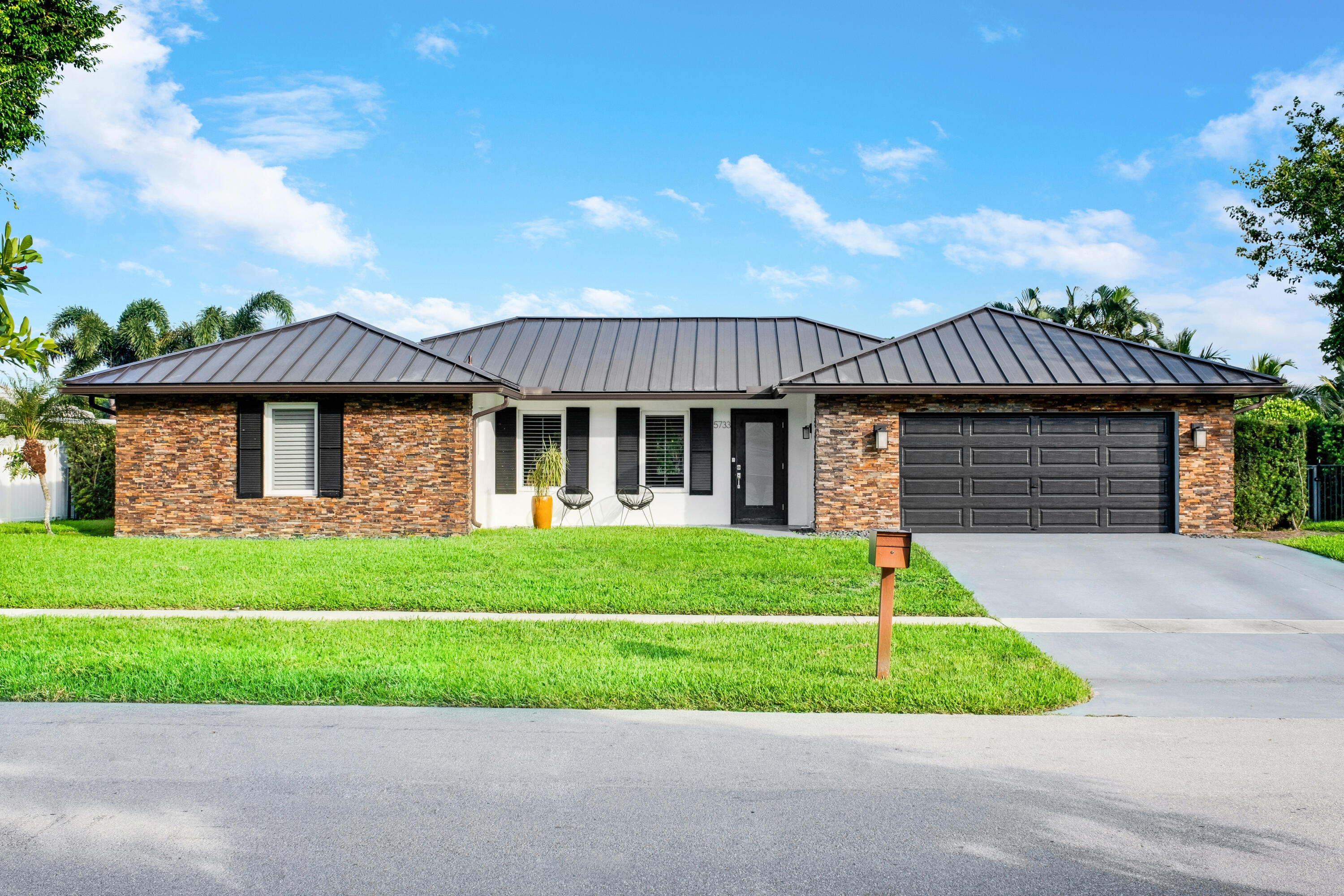 5733 Golfway Drive Boca Raton, FL 33433 - Photo 24 of 25 Front
