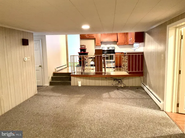 a view of a kitchen with a sink
