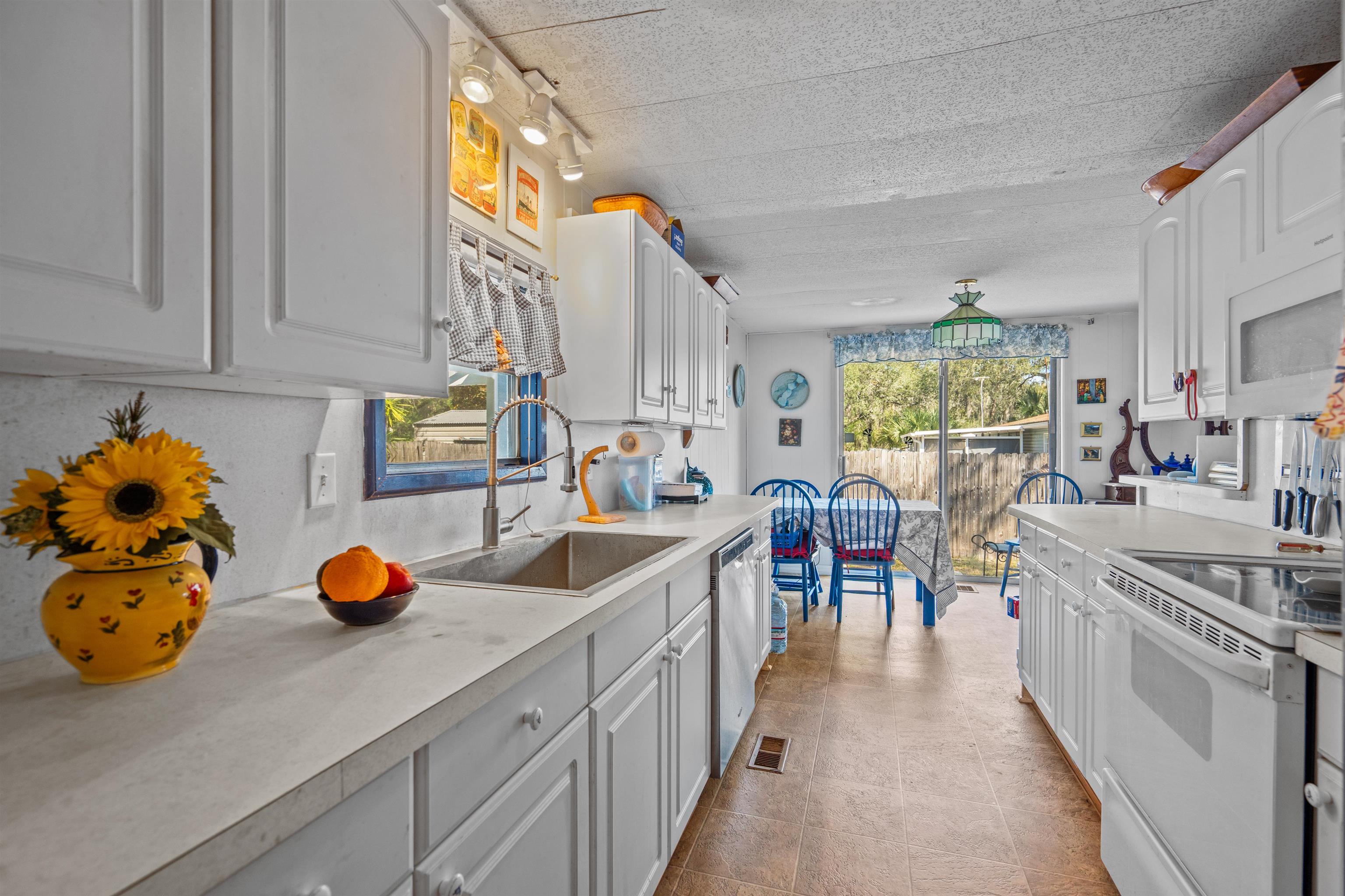 3979 Oak Terrace Road St. Augustine, FL 32086 - Photo 10 of 36 a kitchen with lots of counter top space