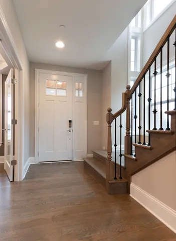 a view of an entryway with stairs