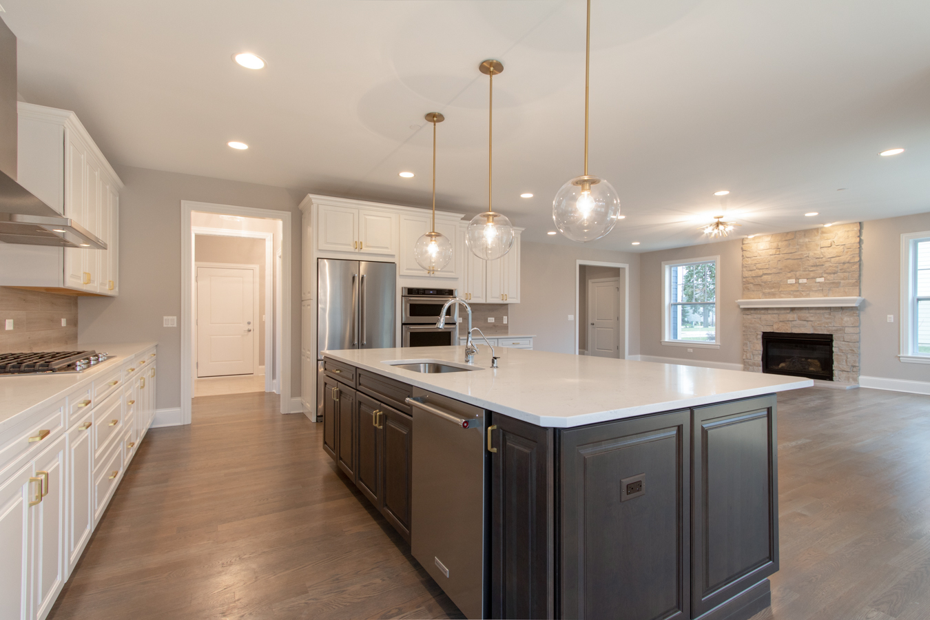 3319 Arbor Lane Prairie Grove, IL 60012 - Photo 4 of 13 a kitchen with a sink and a stove top oven