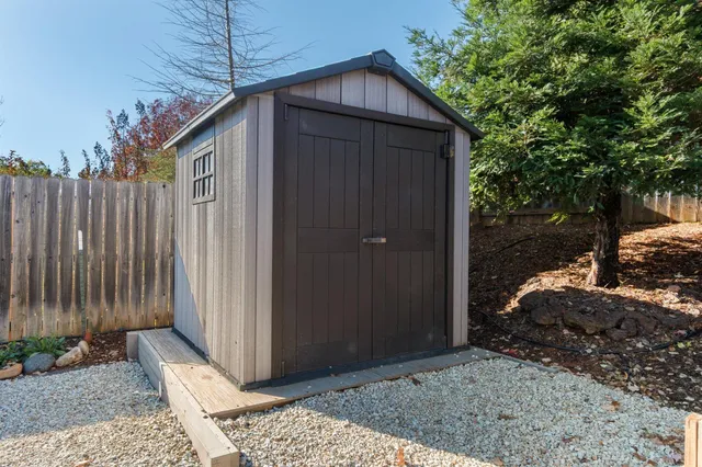 a wooden door with a outdoor space