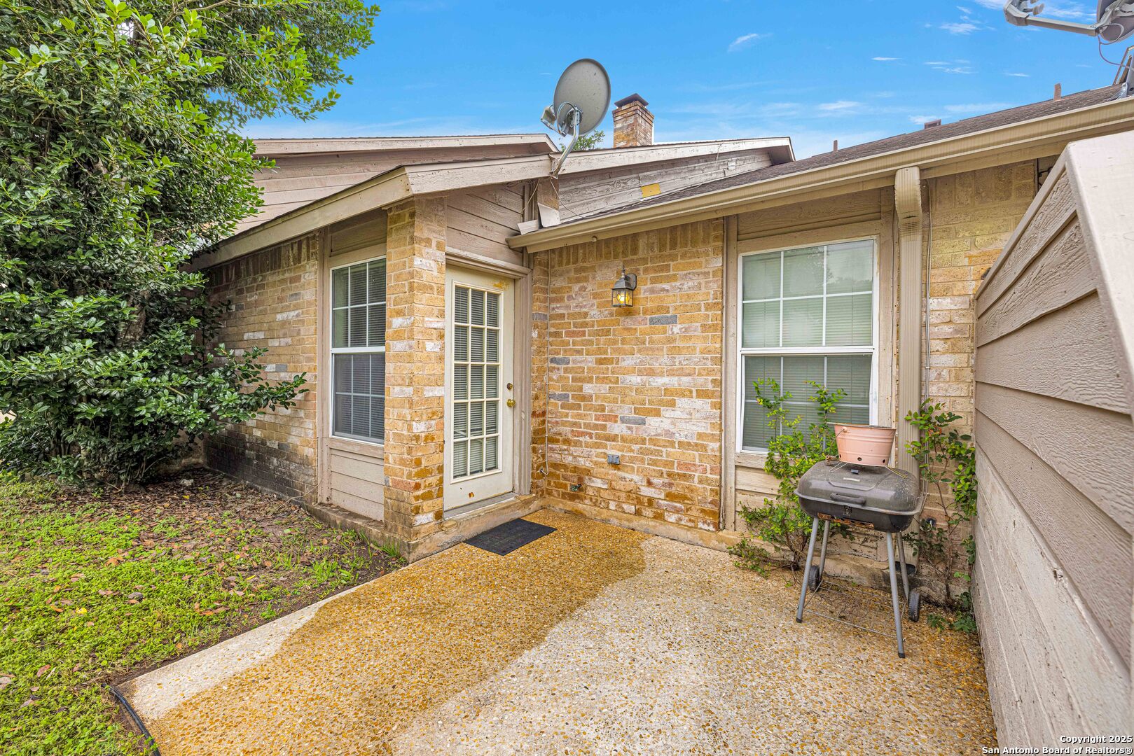 60 Oak Villa Road, Unit F3 Canyon Lake, TX 78133 - Photo 15 of 22 a front view of a house with garden