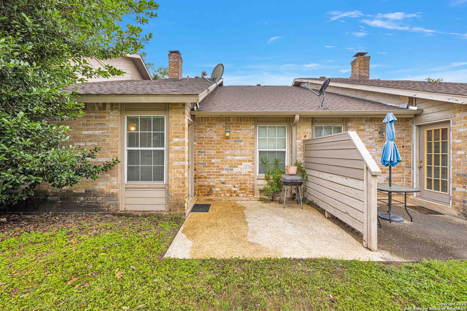 60 Oak Villa Road, Unit F3 Canyon Lake, TX 78133 - Photo 16 of 22 a front view of a house with a yard