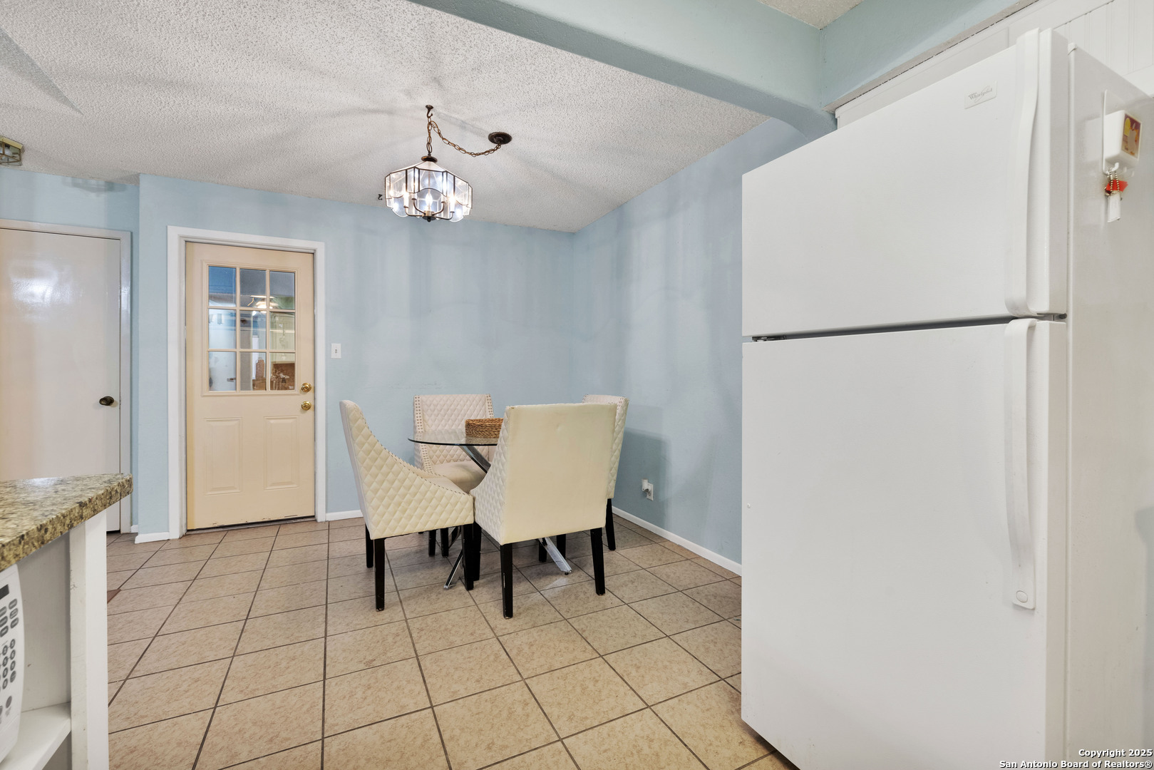 60 Oak Villa Road, Unit F3 Canyon Lake, TX 78133 - Photo 6 of 22 a view of a dining room with furniture