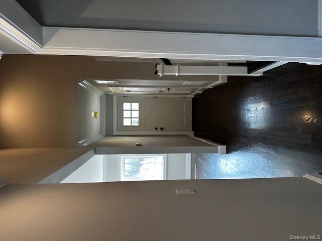 558 Oxford Road Cedarhurst, NY 11516 - Photo 6 of 22 Entrance foyer with crown molding and wood finished floors