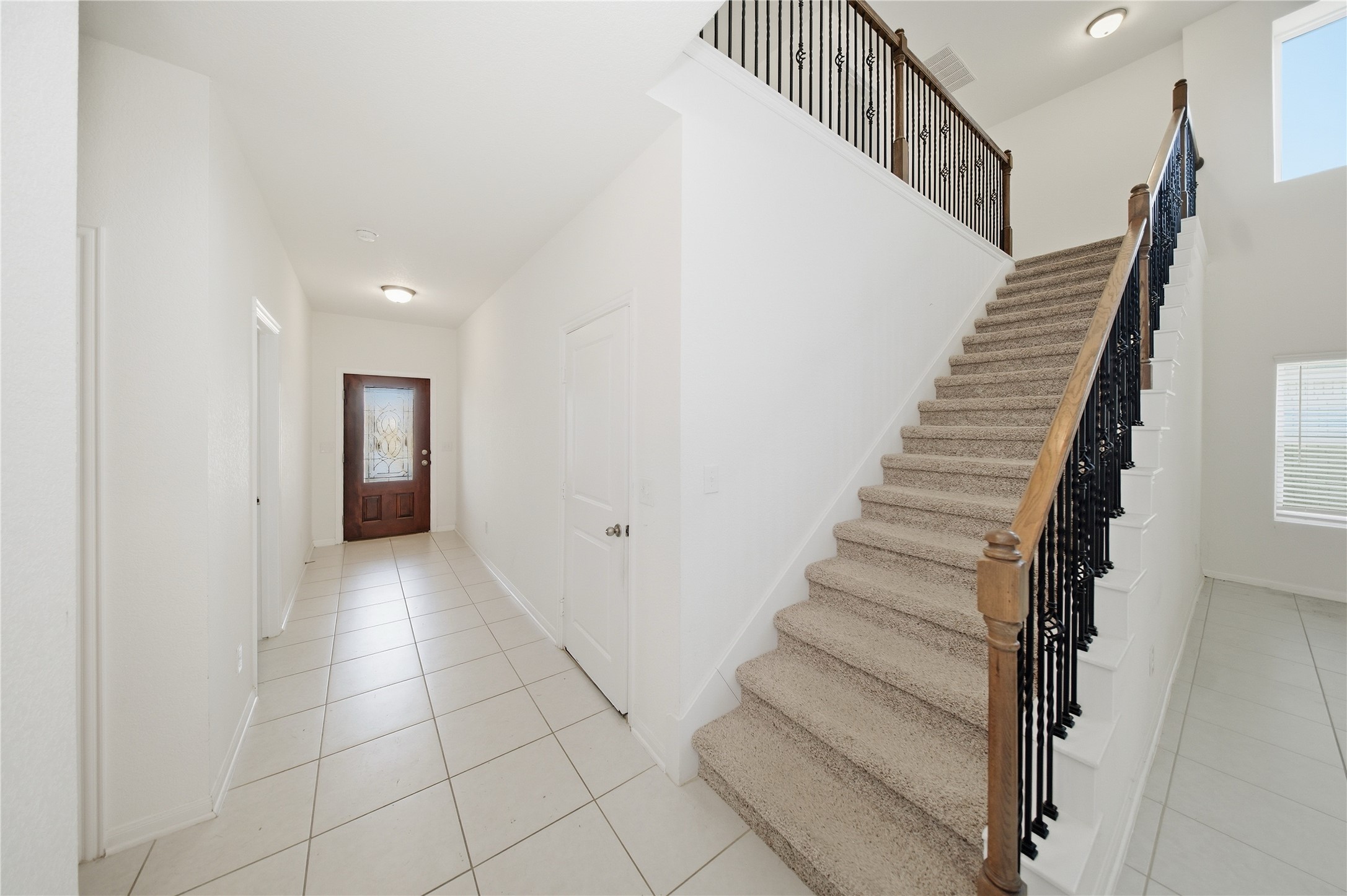 513 Warlander Way Georgetown, TX 78626 - Photo 16 of 35 a view of entryway and hall with wooden floor