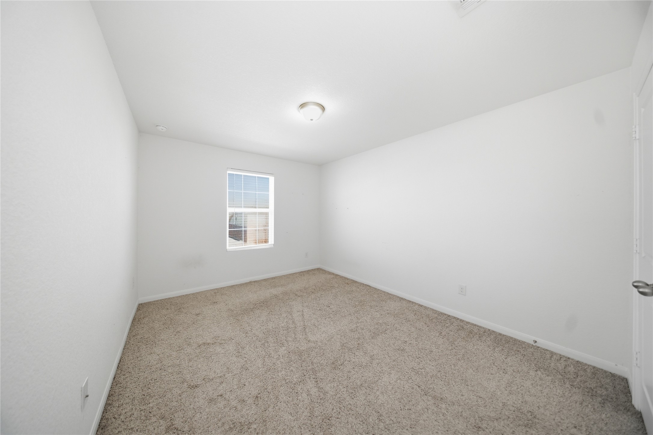 513 Warlander Way Georgetown, TX 78626 - Photo 24 of 35 an empty room with a window