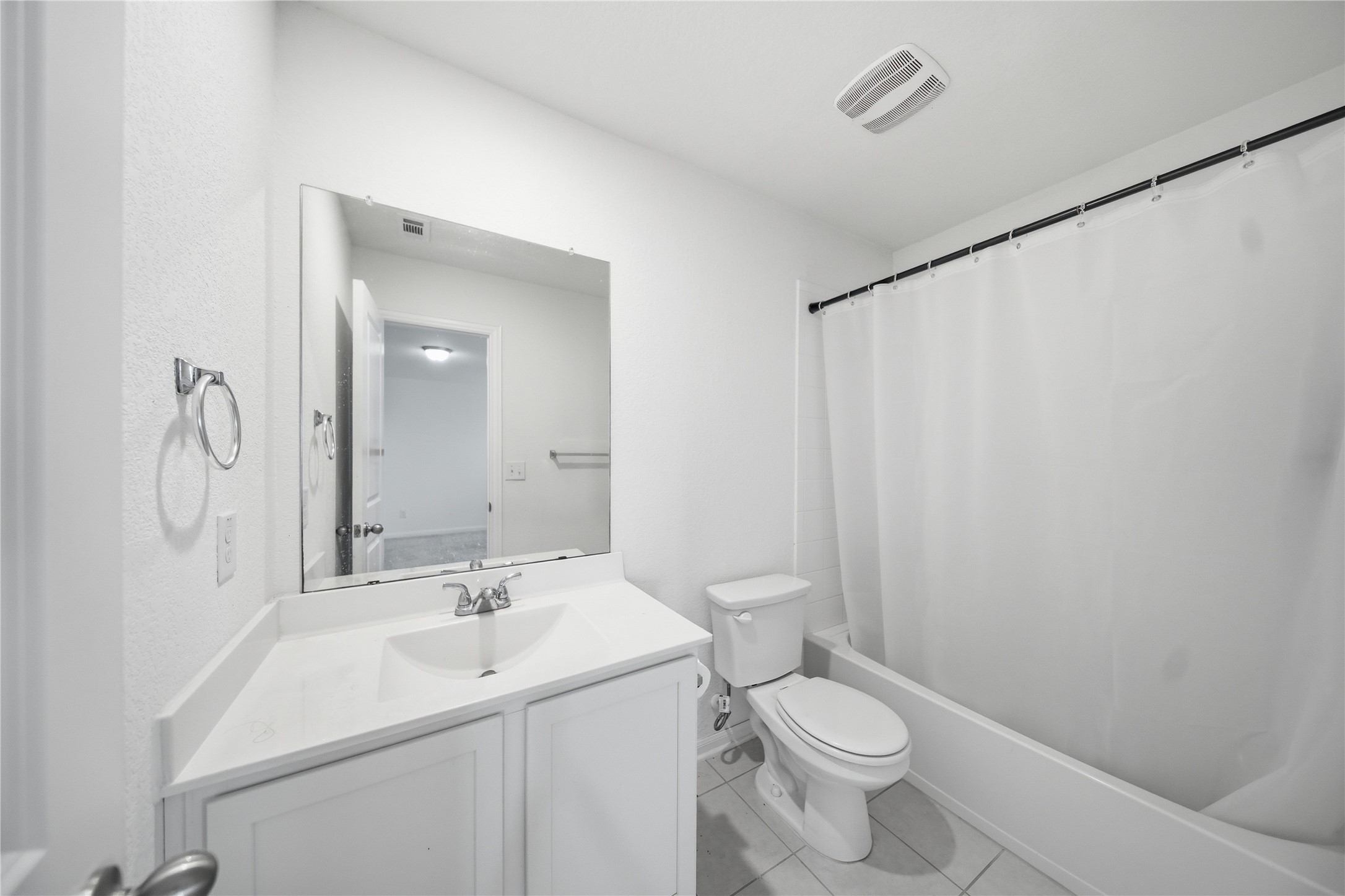 513 Warlander Way Georgetown, TX 78626 - Photo 29 of 35 a bathroom with a toilet sink and mirror