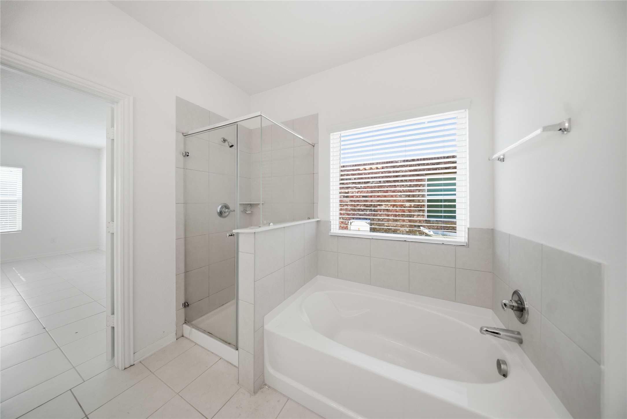 513 Warlander Way Georgetown, TX 78626 - Photo 30 of 35 a white bath tub sitting next to a white sink