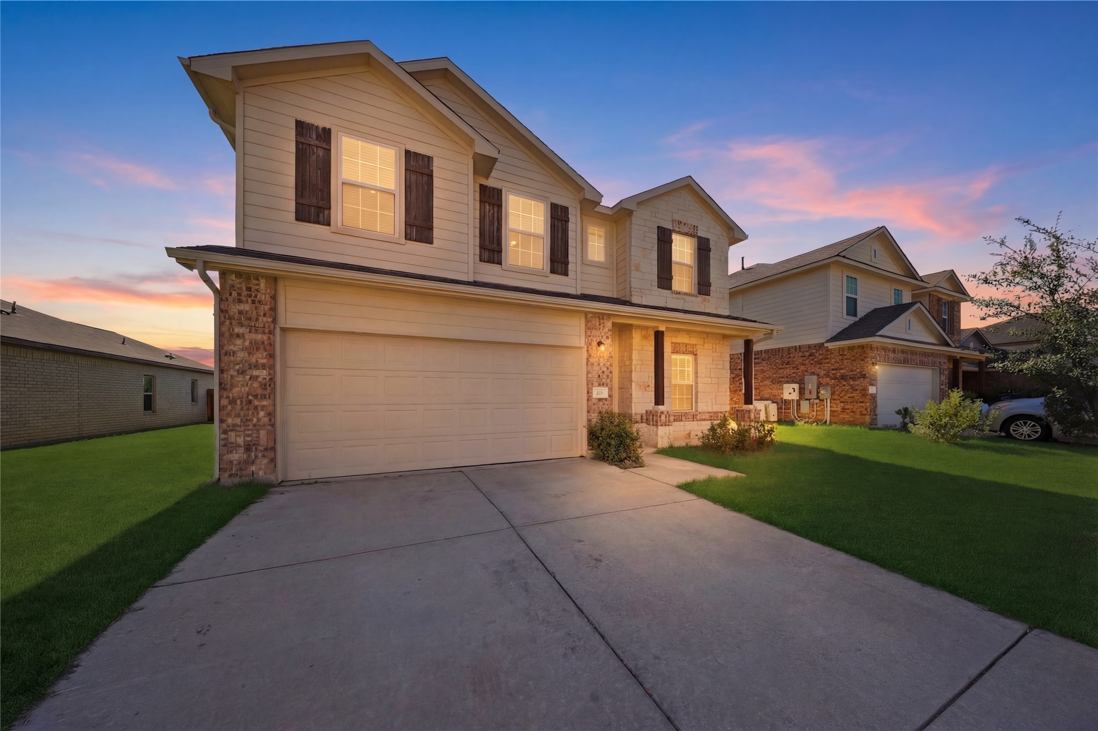 513 Warlander Way Georgetown, TX 78626 - Photo 3 of 35 a front view of a house with a yard and garage
