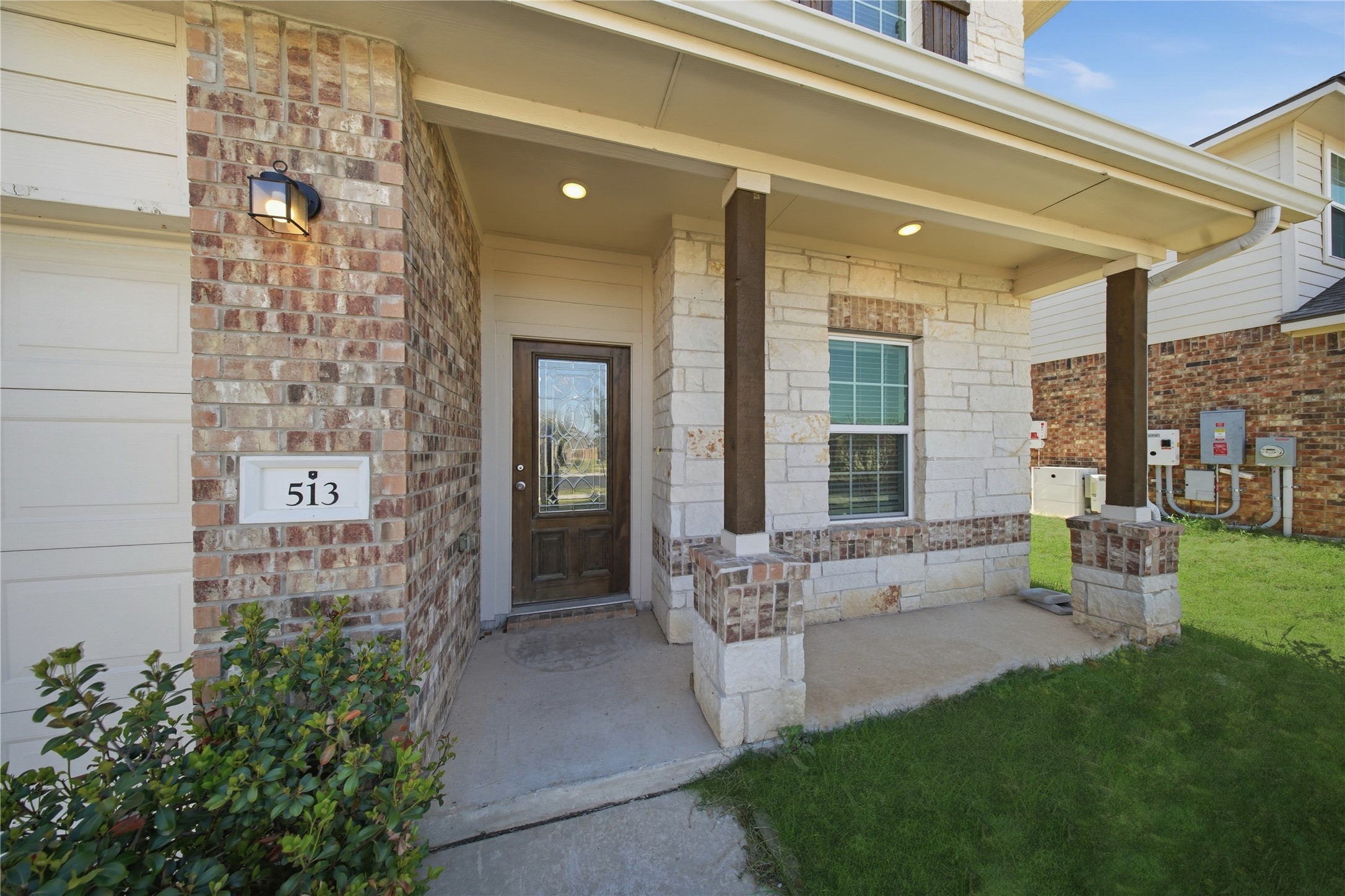 513 Warlander Way Georgetown, TX 78626 - Photo 4 of 35 a front view of a house with a yard