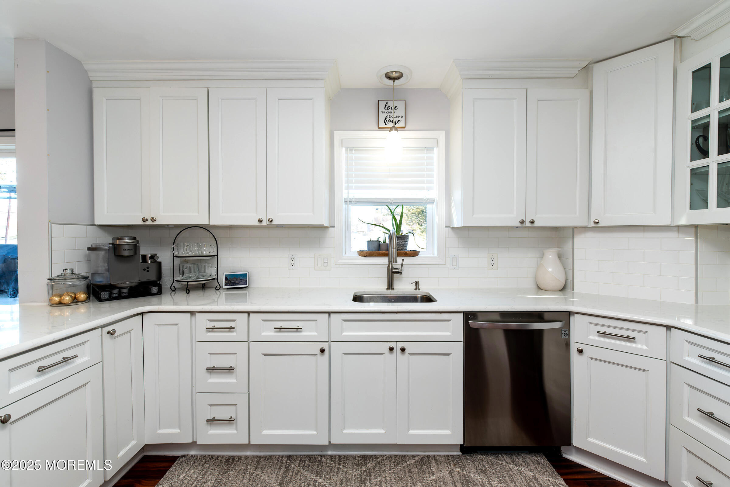 194 Club House Road Brick, NJ 08723 - Photo 3 of 45 a kitchen with white cabinets and white appliances