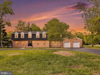 a view of a house with a big yard