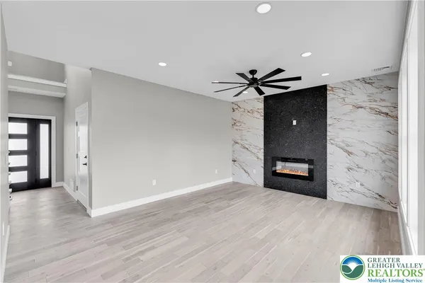 a view of entryway with wooden floor