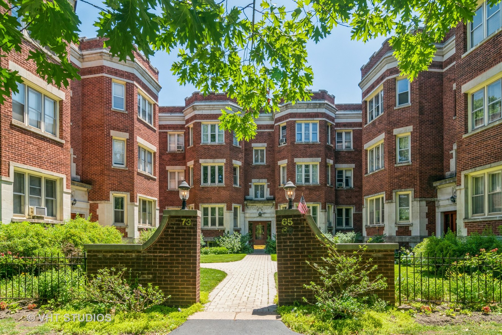 a front view of a multi story residential apartment buildings