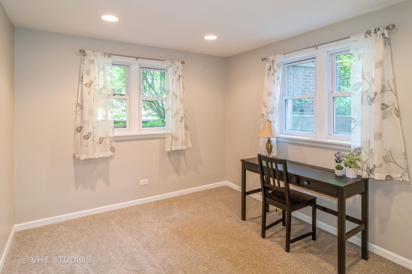 65 Longcommon Road, Unit G Riverside, IL 60546 - Photo 8 of 19 a workspace room with furniture and windows